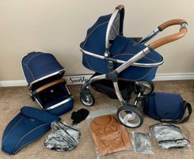 egg pram navy and tan